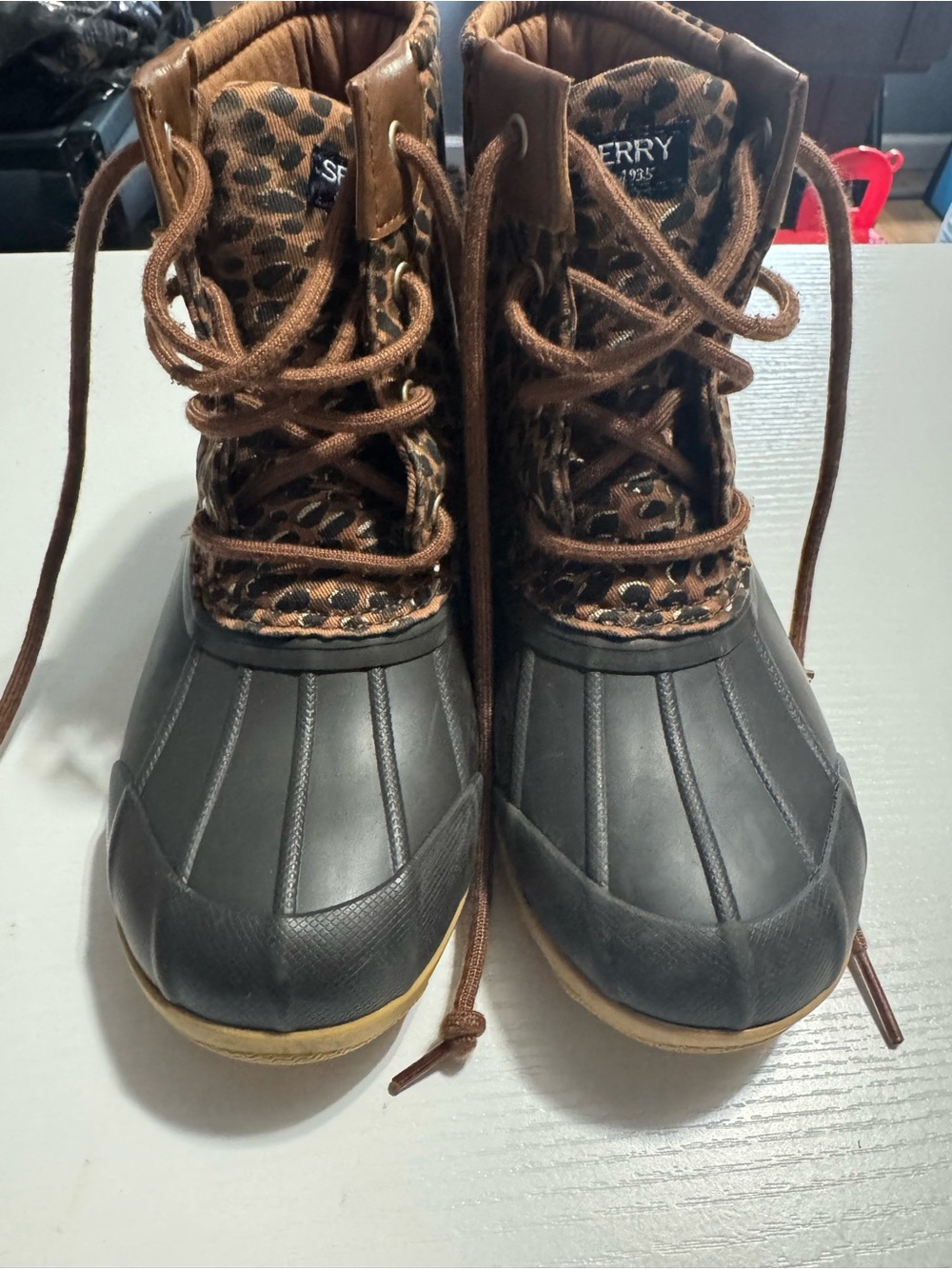 Sperry Black Rubber Duck Boots with Brown Leopard Collar